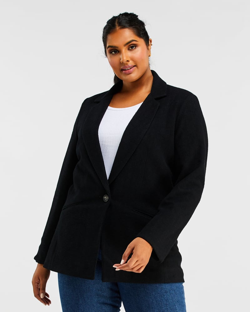 Front of a model wearing a size 1X Homeland Blazer in Black by Estelle. | dia_product_style_image_id:234998